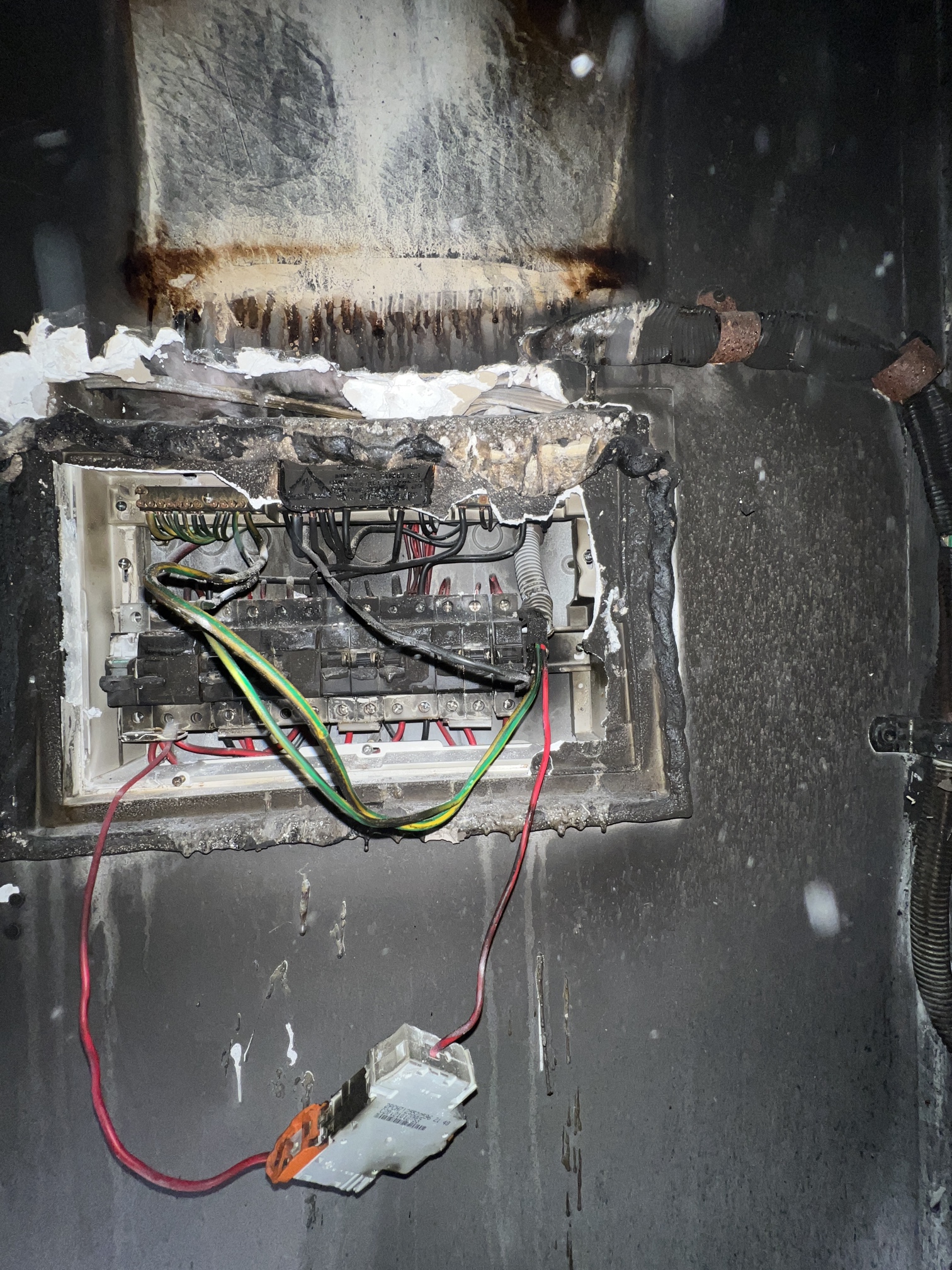 Electrical switchboard that has been damaged through extreme heat by fire caused by electrical fault